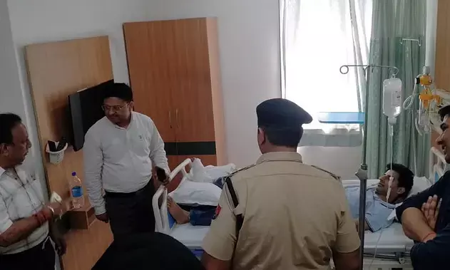 RTGS करवाने आए ग्राहक के पैर में लगी बैंक गार्ड की गोली