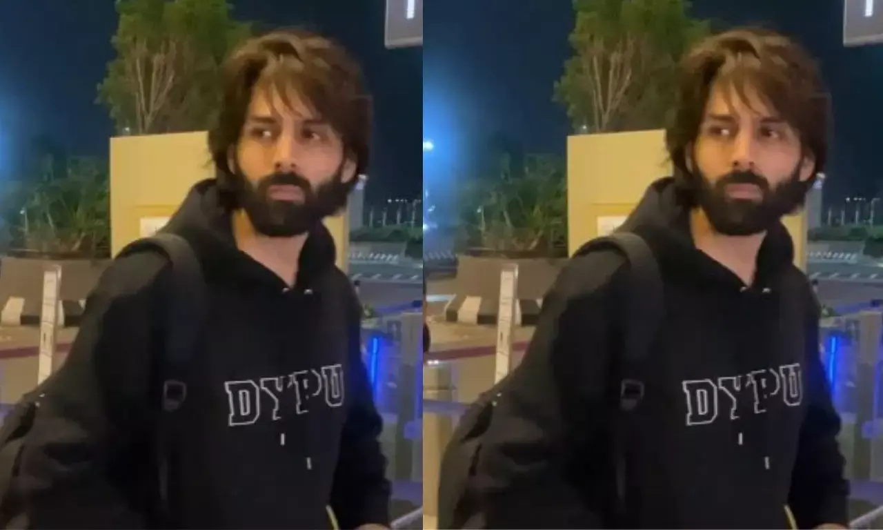 काली हुडी और सफेद ट्राउजर में एक्टर कार्तिक आर्यन का एयरपोर्ट लुक, यूथ के लिए बना नया ट्रेंड