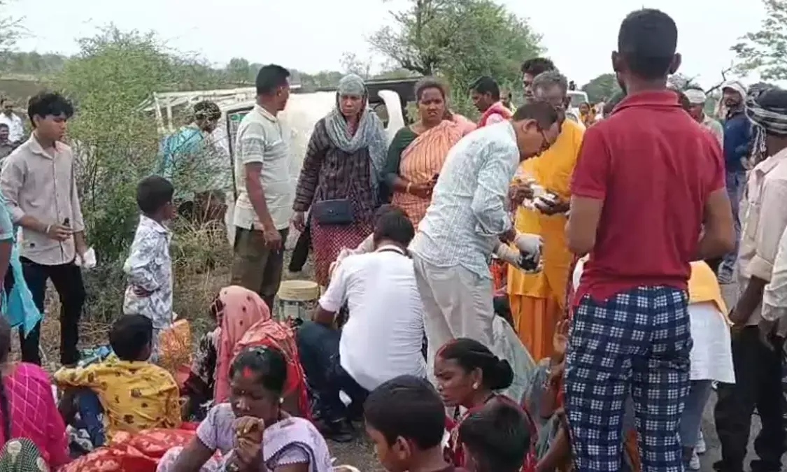 A pickup full of villagers going to the Chhath festival