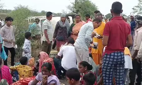 A pickup full of villagers going to the Chhath festival
