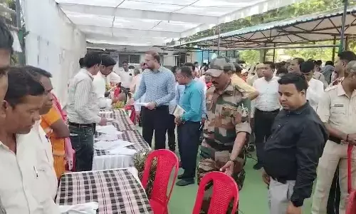 Administrative officer taking application