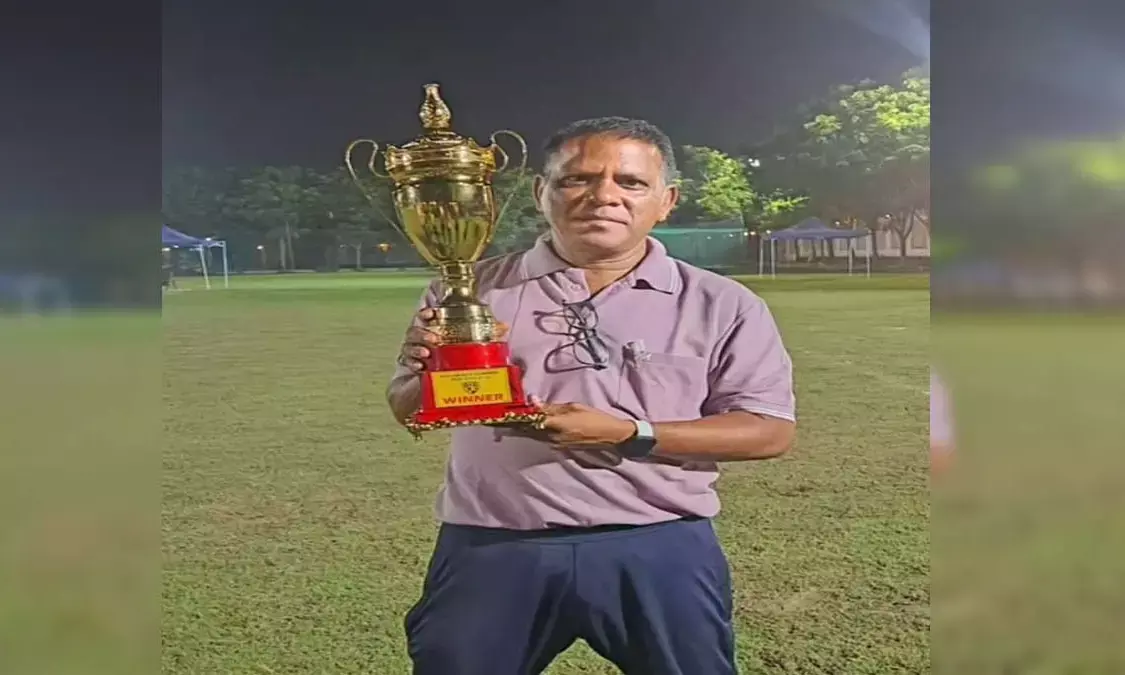 Coach dies of heart attack