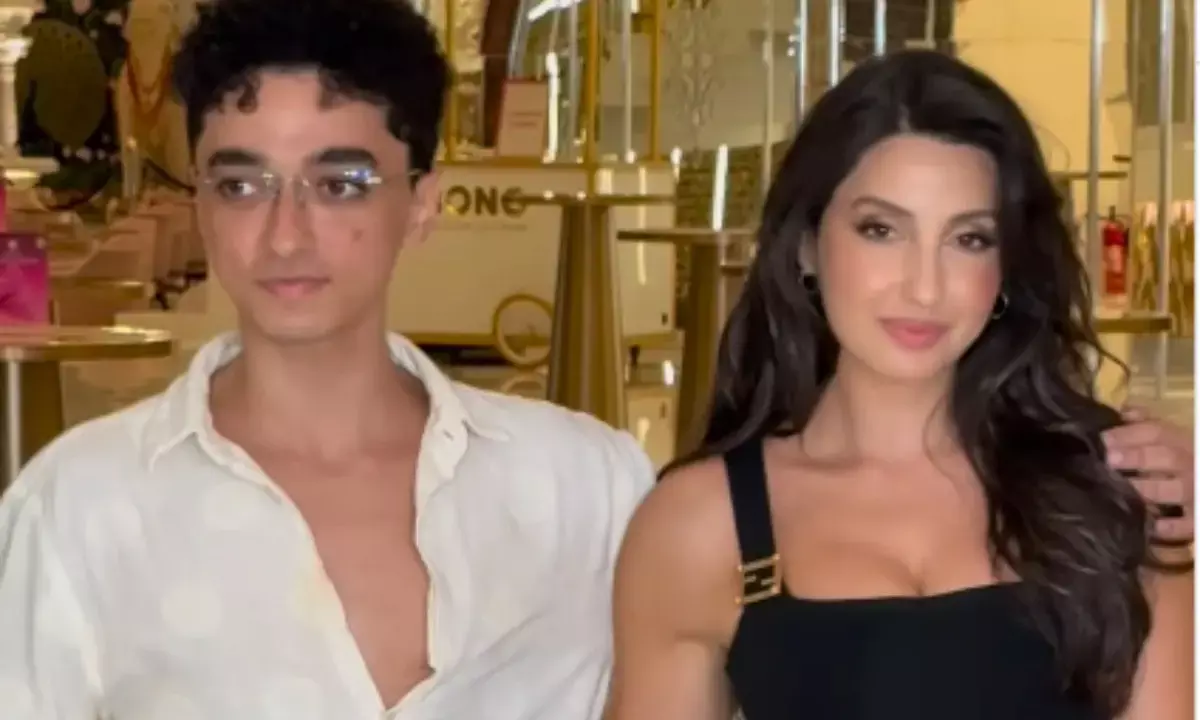 nora fatehi poses with brother omar video goes viral