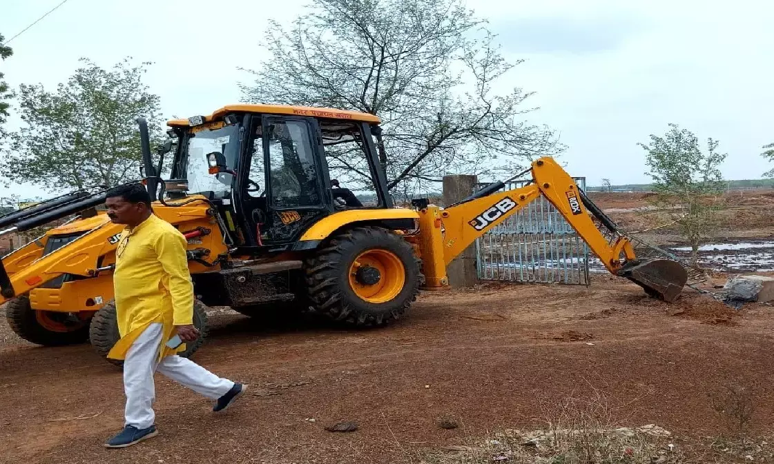 Bulldozer runs on encroachment