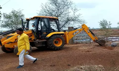 Bulldozer runs on encroachment