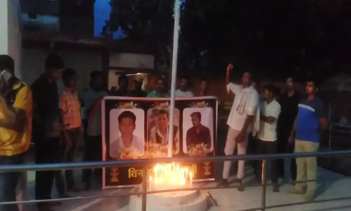 Candle march against killing of tribals