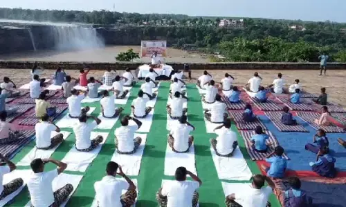 CRPF officers and soldiers doing yoga