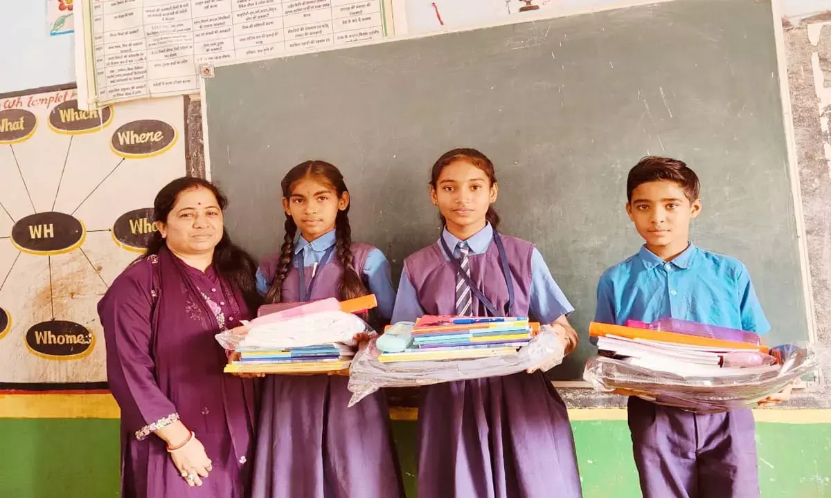 Teacher Pratik Jain with those three children