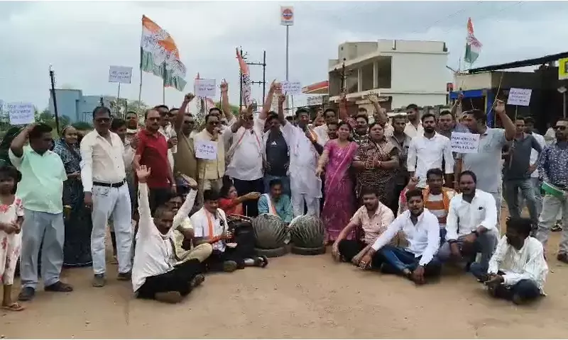 MLA Yashoda Verma demonstrating by playing the drum