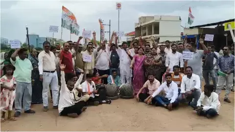 MLA Yashoda Verma demonstrating by playing the drum