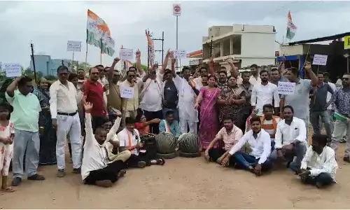 MLA Yashoda Verma demonstrating by playing the drum