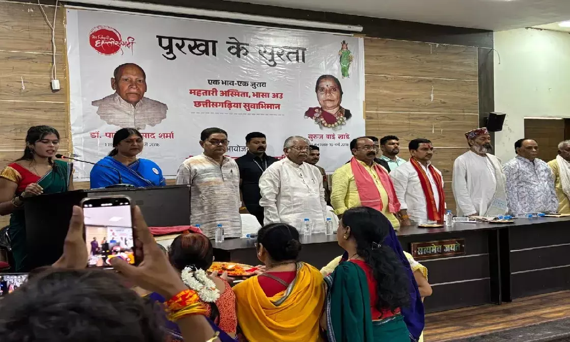 Dignitaries standing on stage