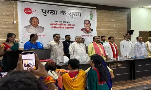 Dignitaries standing on stage