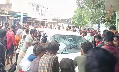 Villagers reprimanding the driver