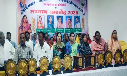 MLA Uttari Jangde sitting on the stage