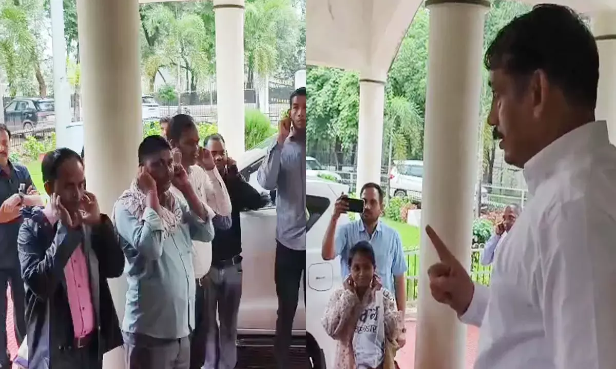 Collector Verma reprimanding the employees