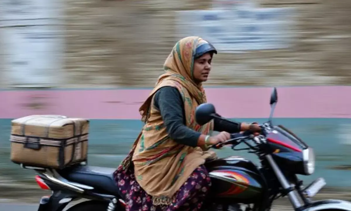 Women delivery rider India Women delivery rider India