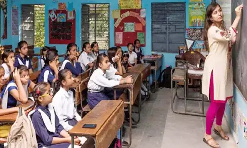 teacher teaching children in class teacher teaching children in class