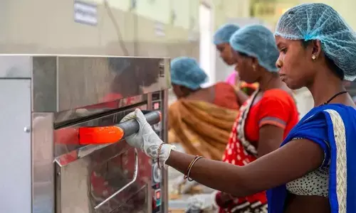 tribal women group processing natural forest produce