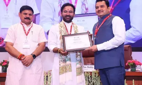Kishan Reddy honored Mineral Secretary P. Dayanand by giving him a citation