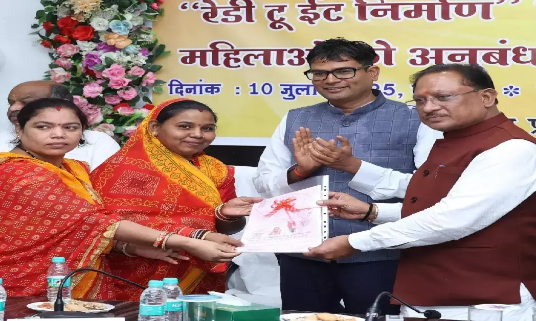 CM Vishnudev Sai handing over contract letters to women