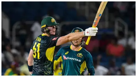 Mitchell owen debut fifty as australia beat west indies in 1st T20I