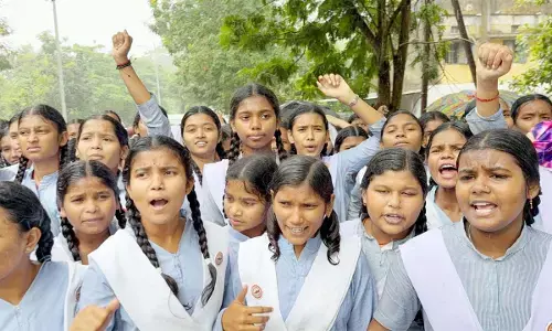 Girls shouting slogans