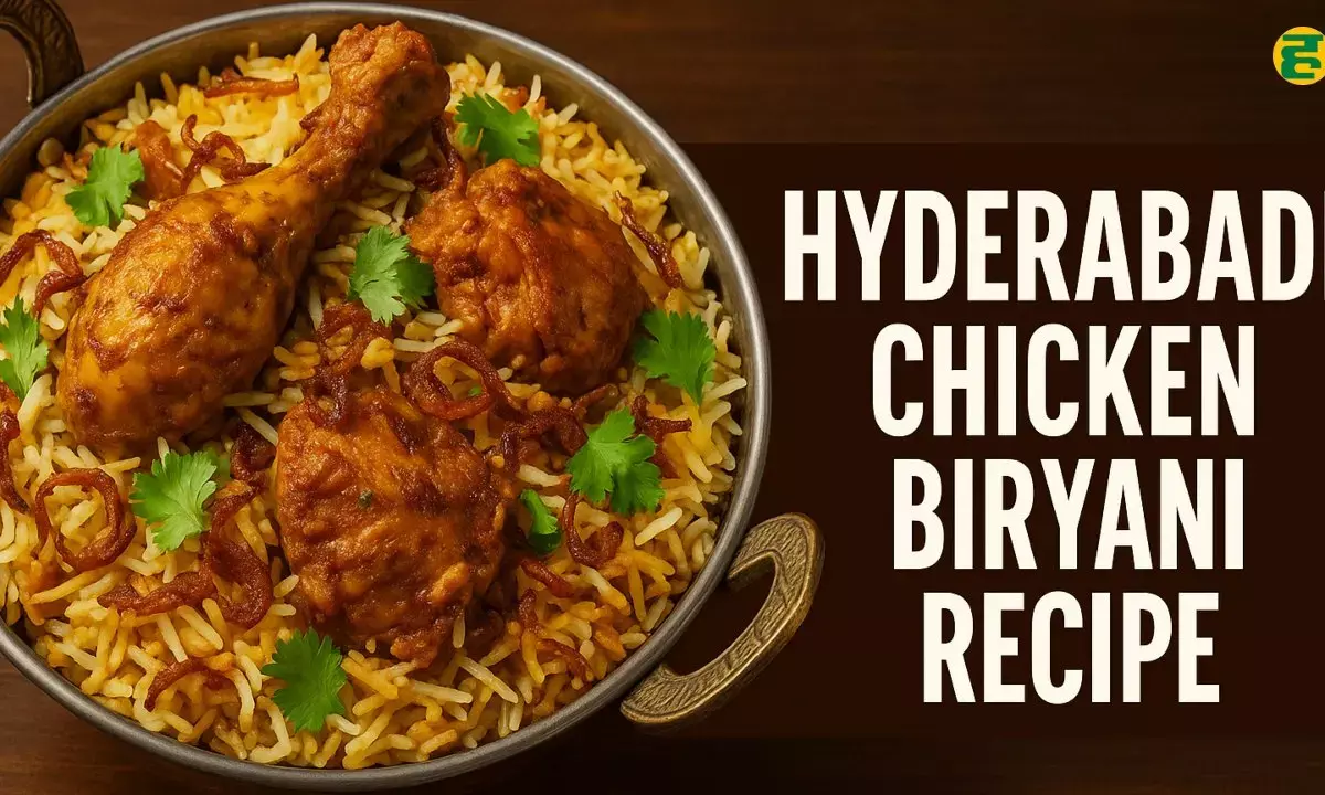 Hyderabadi Chicken Biryani, served in a single pot, featuring spicy chicken, fried onions, and aromatic basmati rice, garnished with coriander.