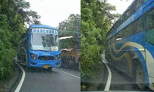 Car driver narrowly escapes collision with bus