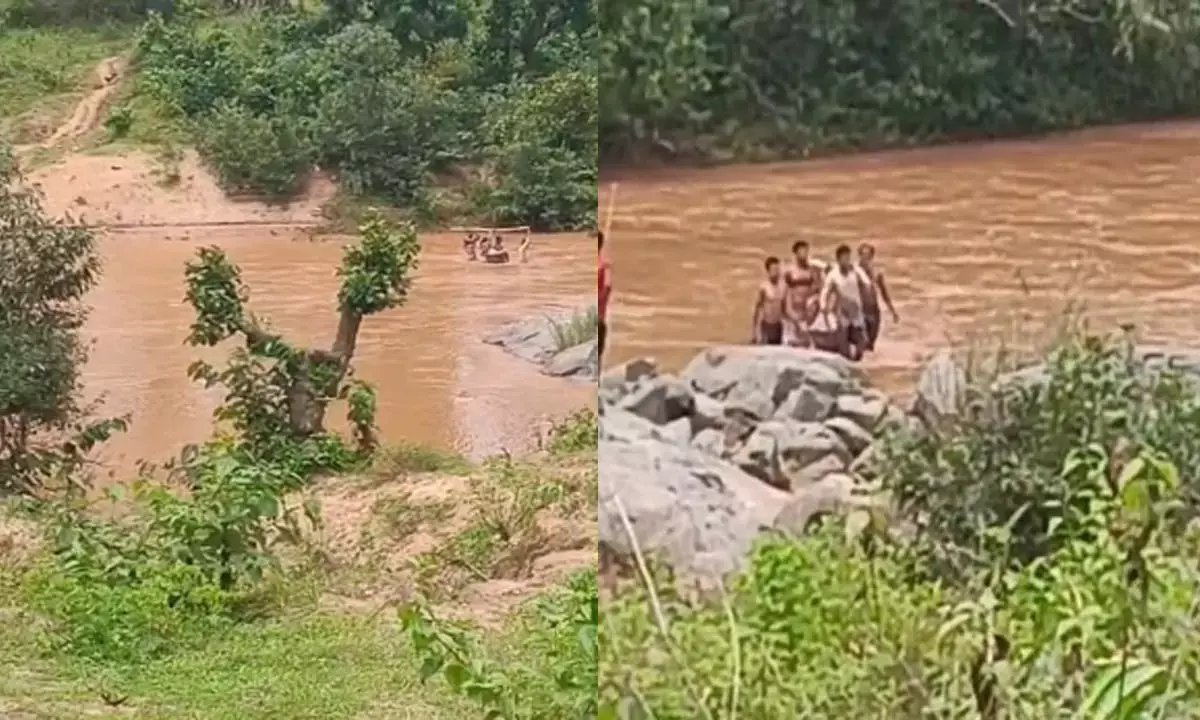गर्भवती महिला को लेने के लिए 102 महतारी एक्सप्रेस के कर्मचारियों ने बहती नदी को पार कर गर्भवती महिला तक पहुंचे गर्भवती महिला को लेने के लिए 102 महतारी एक्सप्रेस के कर्मचारियों ने बहती नदी को पार कर गर्भवती महिला तक पहुंचे