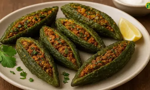 Bharwa Karela Recipe full of spicy stuffing and sweet-sour taste.