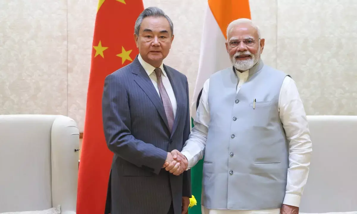Prime Minister Narendra Modi meets Chinese Foreign Minister Wang Yi.