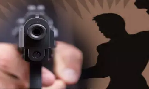 In Ghaziabad a property dealer was shot at repeatedly by unknown assailants