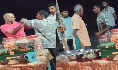 ASI की पिटाई करता हुआ नशेड़ी