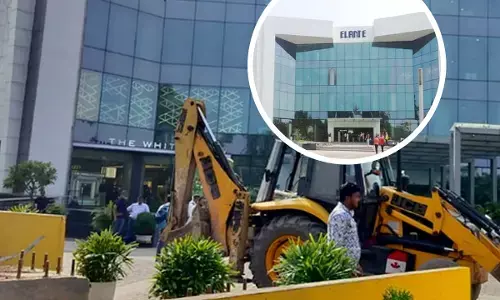 Bulldozer action on Elante Mall
