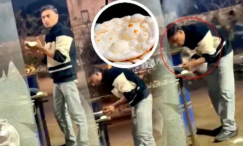 A cook was seen spitting on the bread while cooking in Ghaziabad the video went viral